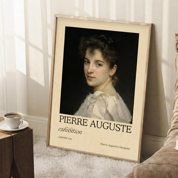 May include: Framed art print leaning against white wall on fluffy white rug next to wooden side table with coffee cup. Print shows classical portrait painting of young woman with curly hair in white dress against dark background. Cream matting with "PIERRE AUGUSTE exhibition" text below image. Soft natural lighting creates shadows on wall.