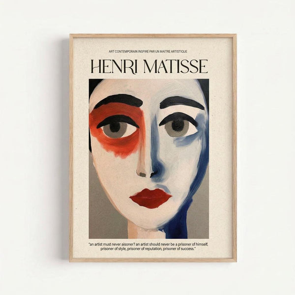 May include: Framed art print hanging on white wall featuring abstract portrait in Matisse style with asymmetrical face, red area around left eye, blue shadowing, black eyebrows, red lips, and pale skin tones. Light wood frame surrounds cream-colored background with black text above and below the portrait image.