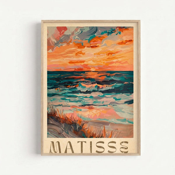 May include: Framed poster print featuring an abstract seascape painting with vibrant orange and pink sunset sky, teal ocean waves, and sandy beach with grass in foreground. The artwork shows expressive brushstrokes and bold colors in an impressionistic style. Text reading "MATISSE" appears at bottom of print. Light wood frame mounted on white wall.