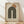 May include: Framed poster with geometric design featuring concentric black arches beneath a rust-colored circle on cream textured paper, displayed in light wood frame leaning against white wall on wooden floor with soft natural lighting creating diagonal shadows