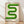 May include: Framed poster with green wavy serpentine design on cream background, displaying "bauhaus 1919" text below. Wood frame leaning against white wall on light wooden floor with soft natural lighting and shadows.