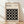 May include: Framed Bauhaus poster with cream background and black geometric pattern of white circles arranged in grid. Modern minimalist design in natural wood frame, leaning against white wall on light wooden floor with soft shadows.