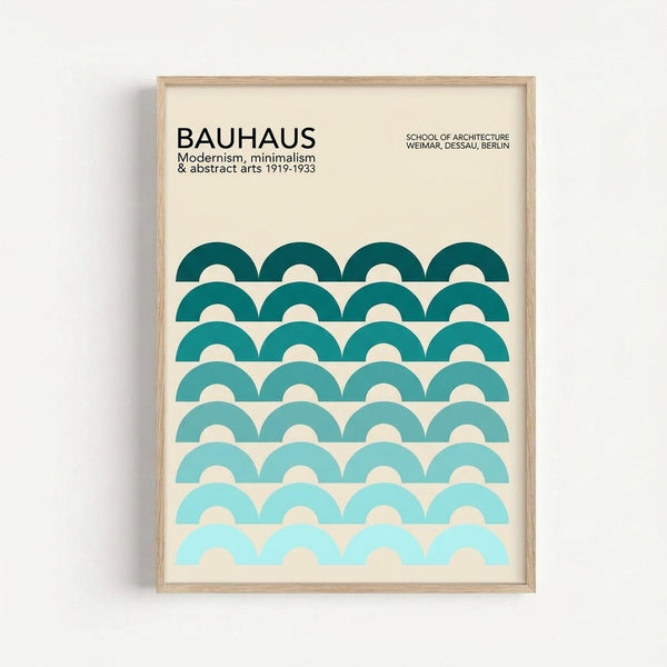 Framed minimalist poster with cream background featuring eight rows of teal semicircles in gradient shades from dark to light blue-green. Black text at top reads "BAUHAUS" with smaller text about modernism, minimalism and abstract arts 1919-1933, plus "SCHOOL OF ARCHITECTURE WEIMAR, DESSAU, BERLIN" in upper right. Light wood frame mounted on white wall.