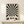 May include: Black and white optical illusion poster with radiating wavy stripes creating a hypnotic sunburst pattern, displayed in light wood frame on cream-colored wooden surface next to small wrapped white gift box with twine and greenery sprig against neutral wall