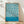 May include: Framed poster with flowing teal and cream wavy lines in a geometric pattern, displayed against white wall on wooden floor. Natural wood frame surrounds the abstract design with "BAUHAUS AUSSTELLUNG Juli - Sept 1923" text at bottom. Plant shadow visible on wall, creating modern minimalist room setting.