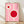 May include: Framed minimalist poster with pink background featuring two connected circular forms in cream and red, displayed against white wall on wooden floor. The geometric design shows Bauhaus-style typography along the right edge. Natural lighting creates soft shadows across the scene.