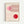 May include: Framed Bauhaus-style poster with geometric design featuring pink and red circles intersected by curved linear patterns on cream background, displayed on white wall in light wood frame