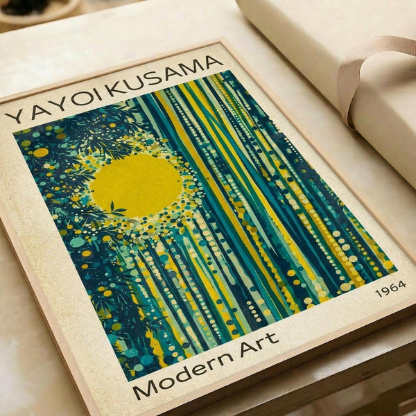 A vintage-style art poster featuring a vibrant abstract composition with a bright yellow sun or moon surrounded by teal and green vertical streaks resembling bamboo or forest elements, decorated with scattered dots and organic shapes. The print has cream borders with "YAYOI KUSAMA" at top, "Modern Art" at bottom, and "1964" in the corner, displayed on white paper with neutral packaging materials visible in the background.
