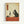 Framed vintage-style Japanese ukiyo-e artwork showing a black cat with white chest sitting at a red table, holding a wine glass. The cat is positioned next to a wine bottle, cheese, and grapes. Features traditional Japanese text in an orange cartouche on cream background with aged paper texture. The illustration uses classic woodblock print styling with fine line details and muted earth tones.