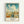 Vintage-style travel poster featuring an aerial view of Savannah's Historic District with colonial buildings, palm-lined streets, and dramatic cloudy sky. The illustration shows warm earth tones and includes text reading "GEORGIA" at the top and "Savannah Historic District - The Hostess City of the South" below. Displayed in a light wood frame against a white wall.