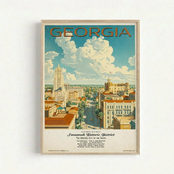 Vintage-style travel poster featuring an aerial view of Savannah's Historic District with colonial buildings, palm-lined streets, and dramatic cloudy sky. The illustration shows warm earth tones and includes text reading "GEORGIA" at the top and "Savannah Historic District - The Hostess City of the South" below. Displayed in a light wood frame against a white wall.