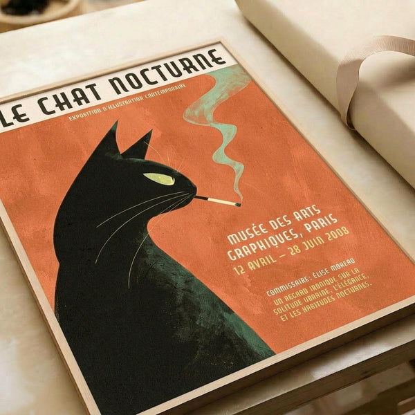 May include: Vintage-style poster print displayed on white paper with cream ribbon nearby. Features minimalist illustration of black cat in profile smoking cigarette with green smoke curl against orange background. French text includes "Le Chat Nocturne" title and museum exhibition details for Paris venue from April-June 2008. Mid-century modern aesthetic with retro color palette.