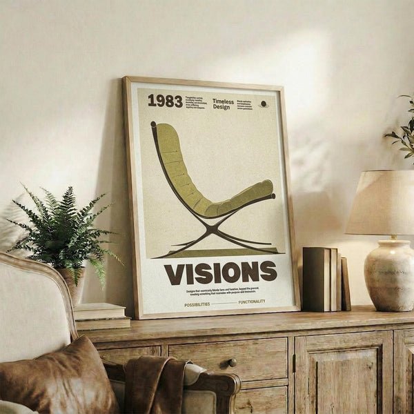 May include: Framed vintage-style poster featuring green mid-century modern lounge chair illustration on cream background, displayed on rustic wooden credenza alongside fern plant, ceramic vases, and books in neutral-toned living room setting