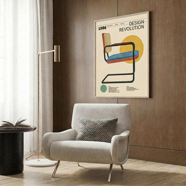 May include: Modern cream armchair with geometric pillow in contemporary room setting with wood paneled walls. Framed vintage-style poster showing colorful modernist chair design with yellow and blue accents against cream background. Gold floor lamp and dark round side table with open book complete the mid-century modern aesthetic.