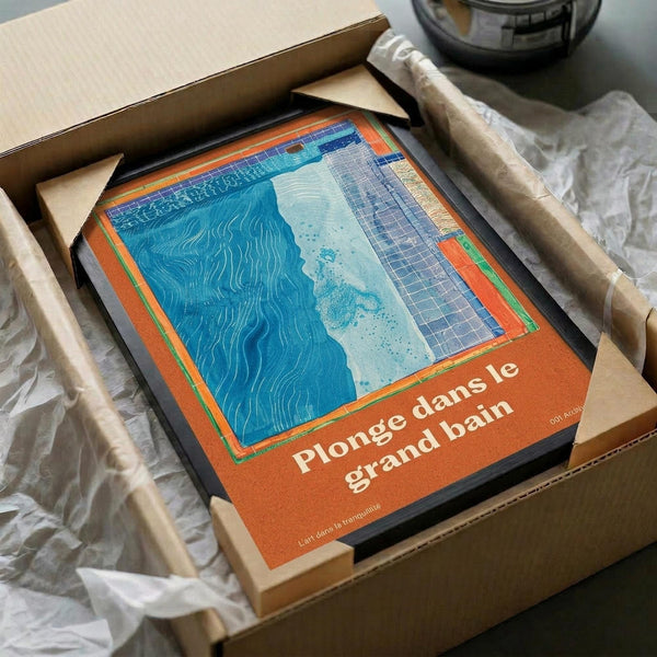 May include: Framed art print with abstract blue swimming pool design featuring wavy water patterns and geometric tile sections, displayed in black frame inside cardboard shipping box with protective packaging materials and wooden frame corners visible