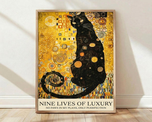 May include: Framed poster print featuring a black cat in Gustav Klimt's golden art style with ornate circles, geometric patterns, and decorative swirls on a golden yellow background. Text reads "Nine Lives of Luxury" and "No Paws in My Plans, Only Purrfection." Light wood frame displayed on wooden floor against white wall with natural lighting.