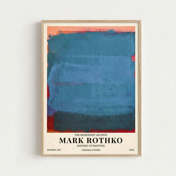 Framed abstract color field print featuring horizontal bands of blue and teal with orange and red accents along the edges. The artwork has a soft, watercolor-like texture with blended transitions between colors. Below the image is text reading "THE MODERNIST ARCHIVE MARK ROTHKO HISTORY OF PAINTING" with additional smaller text including "MODERN ART," "CHROMA STUDIES," and "1950s." The print is displayed in a light wood frame against a white wall.