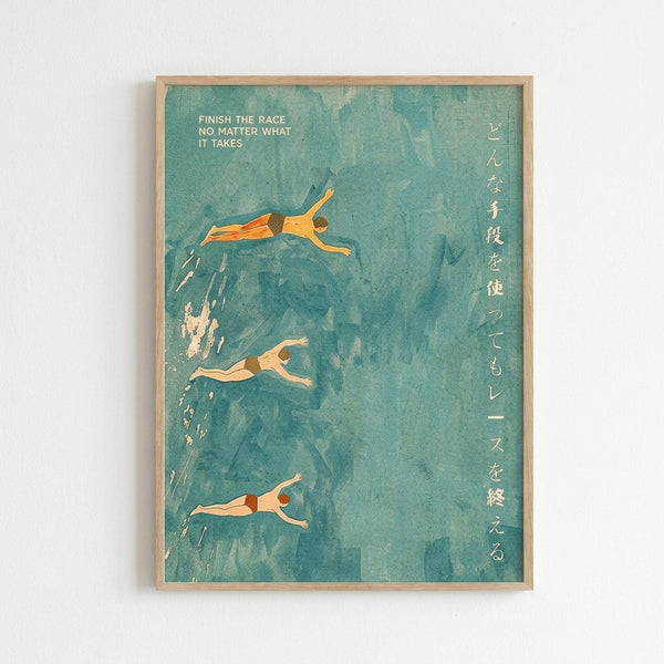 May include: Framed poster print hung on white wall showing three swimmers diving into turquoise blue water. Art features Japanese text vertically aligned on right side and English text "FINISH THE RACE NO MATTER WHAT IT TAKES" in upper left. Swimmers depicted in warm orange and peach tones against textured aqua background with visible brushstroke effects. Light wood frame surrounds the vintage-inspired illustration.