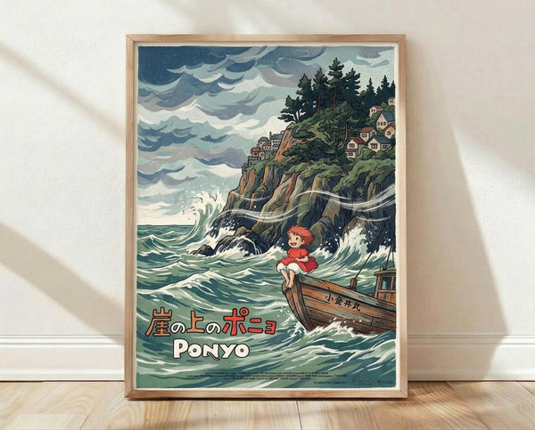 May include: Framed poster print featuring an anime-style illustration of a red-haired child in a red dress sitting on a wooden boat in choppy ocean waters. The scene shows dramatic waves crashing against rocky cliffs topped with houses and evergreen trees under stormy blue-gray clouds. Japanese text and "PONYO" appear at the bottom. The poster has a light wood frame and leans against a white wall on wooden flooring with soft natural lighting creating shadows.