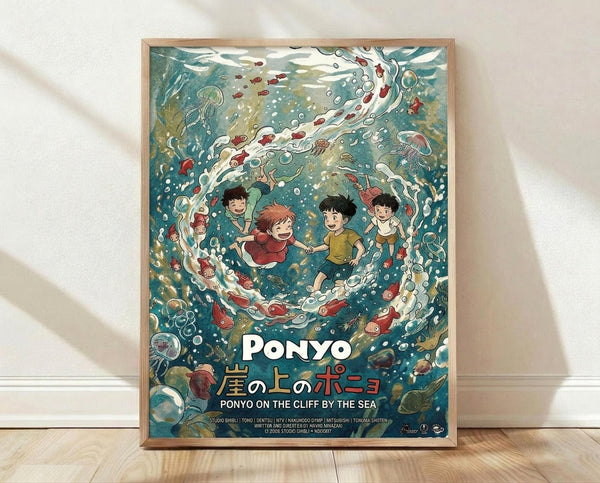 May include: Framed poster print in light wood frame leaning against white wall on wooden floor. Artwork shows underwater scene with four children floating together surrounded by swirling water, colorful fish, and jellyfish in teal and turquoise tones. White and Japanese text at bottom reads "PONYO" and "PONYO ON THE CLIFF BY THE SEA" with Studio Ghibli credits. Soft natural lighting creates gentle shadows on textured white wall.