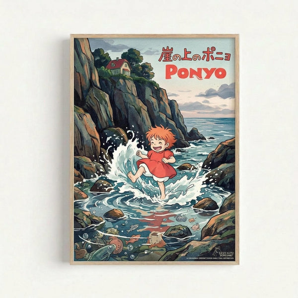 Framed poster featuring animated character Ponyo splashing in ocean tide pools among rocky cliffs. The red-haired child in orange dress plays in foamy seawater with sea creatures visible below. A small house sits atop the coastal cliffs under cloudy skies. Japanese text and "PONYO" appear in red lettering at top. The artwork has Studio Ghibli's distinctive watercolor animation style with natural wood frame against white wall.