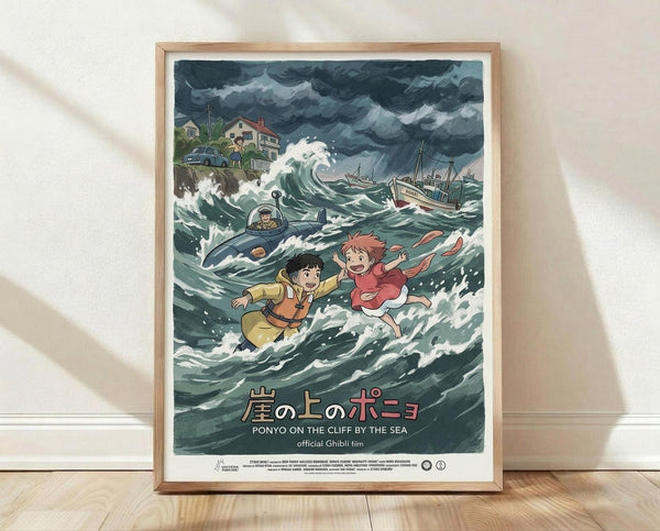 May include: Framed poster print in light wood frame leaning against white textured wall on wooden floor. Artwork shows animated scene with two children floating in stormy ocean waves, submarine visible, dramatic cloudy sky above coastal houses and boats. Japanese text and English subtitle at bottom. Poster appears medium-sized with white matting around colorful illustration in Studio Ghibli anime style.