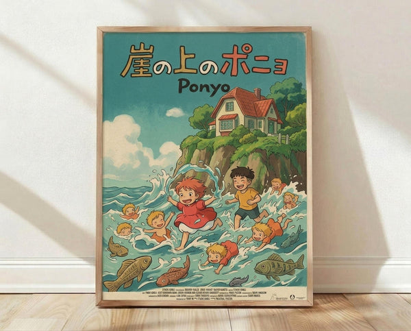 May include: Framed poster print in light wood frame leaning against white wall on wooden floor. Features Studio Ghibli anime-style artwork showing children swimming and playing in blue-green ocean water with fish, while a house sits on clifftop surrounded by lush green trees under cloudy sky. Japanese text at top with "Ponyo" subtitle. Vibrant illustration in classic animation poster style with turquoise, green, and warm earth tones.