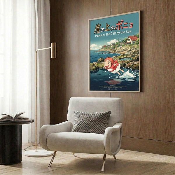 May include: Framed Ponyo on the Cliff by the Sea movie poster displayed on wood-paneled wall above beige armchair with geometric pillow. Poster shows red-haired child character swimming in blue ocean water near coastal houses on rocky cliffs. Modern room setting with floor lamp and side table.