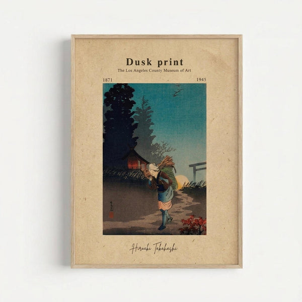 Framed vintage Japanese woodblock print showing a figure carrying bundles of sticks or wood at dusk, walking along a path near traditional buildings. The scene features a turquoise evening sky, dark silhouetted trees, and warm lighting from a small structure. The artwork is matted on aged beige paper with "Dusk print" and "The Los Angeles County Museum of Art" text above, dates "1871-1945" and artist signature "Hiroaki Takahashi" below. Light wooden frame against whit