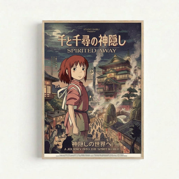 Framed movie poster for Studio Ghibli's Spirited Away featuring anime-style artwork of a young girl with reddish-brown bob haircut wearing a pink and white outfit. Behind her is a fantastical Japanese bathhouse with multiple stories, traditional architecture, and a bridge filled with tiny figures. The scene has a mystical atmosphere with cloudy skies and muted earth tones. Japanese text appears at the top with "SPIRITED AWAY" in English below, and tagline "A JOURNEY INTO THE SPIRIT WORLD&