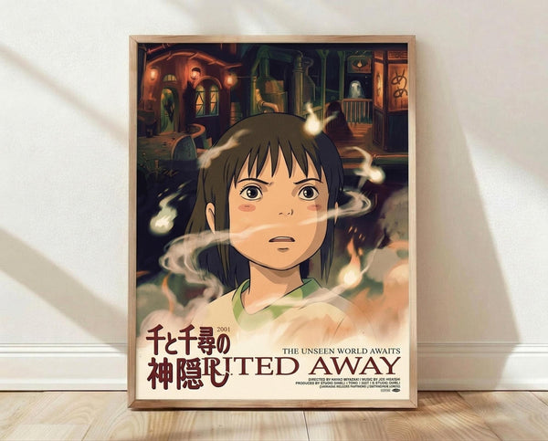 May include: Framed poster print leaning against white wall on light wooden floor. Features anime-style illustration of young girl with brown hair and large eyes, surrounded by swirling white spirits. Background shows mystical bathhouse interior with warm orange and green lighting, traditional architecture, and glowing lanterns. Japanese text and "SPIRITED AWAY" title at bottom in burgundy lettering. Natural wood frame with warm lighting and soft shadows across scene.