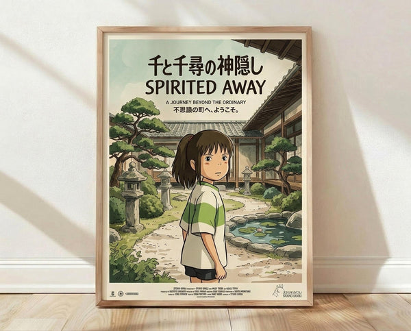 May include: Framed Studio Ghibli Spirited Away movie poster featuring Chihiro, a young girl with brown bob haircut wearing green and white striped shirt, standing in traditional Japanese garden setting with stone lanterns, pond, and wooden buildings. Poster displays Japanese and English text including "A Journey Beyond the Ordinary." Light wood frame rests against white wall on hardwood floor with natural lighting casting shadows.