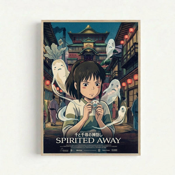 May include: Framed Studio Ghibli Spirited Away movie poster mounted on white wall. Features young girl with short dark hair holding small object, surrounded by translucent spirits in traditional Japanese bathhouse setting with red lanterns and multi-story architecture. Artwork displays rich blues, greens, and warm tones in classic anime illustration style with Japanese and English text at bottom.