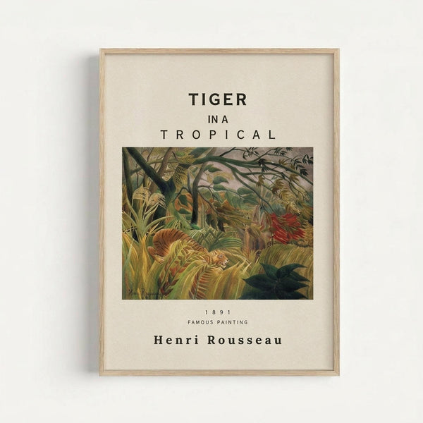 May include: Framed art print displaying Henri Rousseau's jungle painting with dense tropical foliage in greens, yellows and earth tones, featuring a small tiger hidden among ferns and palm leaves. Black text reads "TIGER IN A TROPICAL" above the artwork and "1891 FAMOUS PAINTING Henri Rousseau" below. Light wood frame with white matting, mounted on clean white wall with subtle shadow.