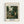 May include: Framed art print featuring Henri Rousseau's lush jungle painting with dense tropical foliage in deep greens, exotic plants, palm fronds, and small flowers. The artwork shows a hidden tiger among the vegetation. Museum-style poster format with cream background, navy text reading "The Equatorial Jungle" and "The National Gallery of Art" at top, artist name and date 1909 at bottom. Natural wood frame mounted on white wall.