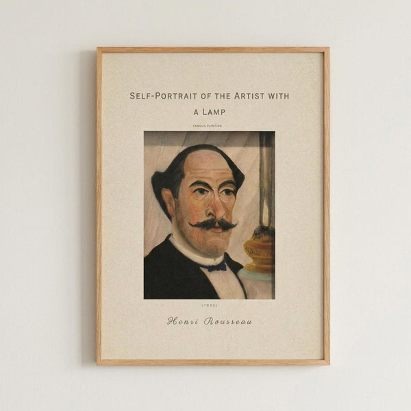 May include: Framed vintage-style art print displaying Henri Rousseau's self-portrait from 1903. Shows a balding man with dark hair, mustache, and formal black suit with bow tie beside an oil lamp. Cream colored background with brown text and wooden frame, mounted on white wall.