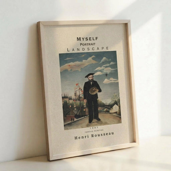 May include: Framed vintage art print featuring a bearded man in dark suit holding a palette, standing in a whimsical landscape with clouds, buildings, and a bridge. The print has cream background with black text reading "MYSELF PORTRAIT LANDSCAPE" at top and "1890 FAMOUS PAINTING Henri Rousseau" at bottom. Light wooden frame sits on white surface against white wall with soft shadows.