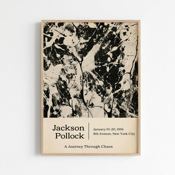 May include: Framed poster print hanging on white wall featuring abstract black and white splattered paint artwork in Jackson Pollock's signature drip painting style. Below the chaotic brushstrokes and paint splatters is cream-colored text reading "Jackson Pollock" with exhibition details "January 10-20, 1956" and "8th Avenue, New York City" plus subtitle "A Journey Through Chaos". Light wooden frame surrounds the vintage-style art print.