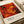 The image is a book cover for "A Journey Through Chaos" by Jackson Pollock, featuring a vibrant abstract painting with splashes of red, orange, and yellow.