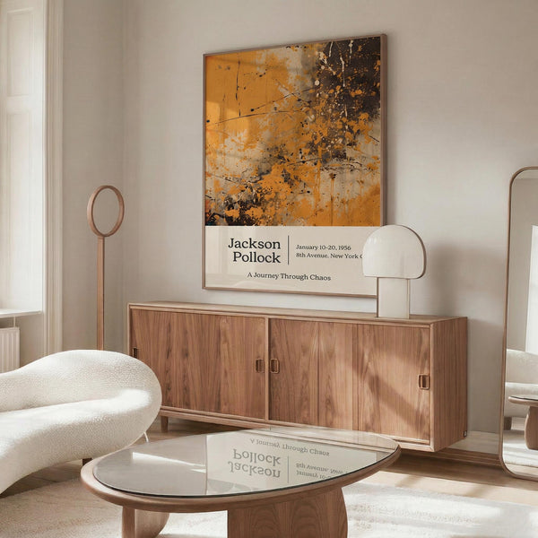 a modern living room with a large abstract painting on the wall, a wooden cabinet, a white sofa, and a glass coffee table.