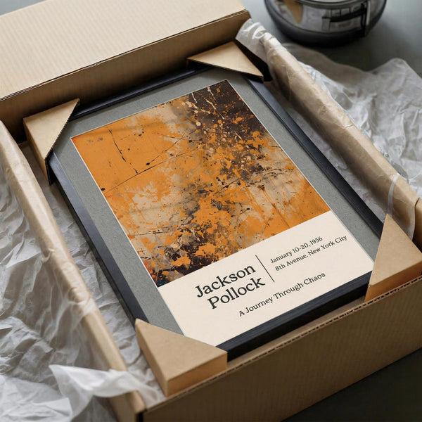 a framed artwork titled "A Journey Through Chaos" by Jackson Pollock, which is a painting in a cardboard box.