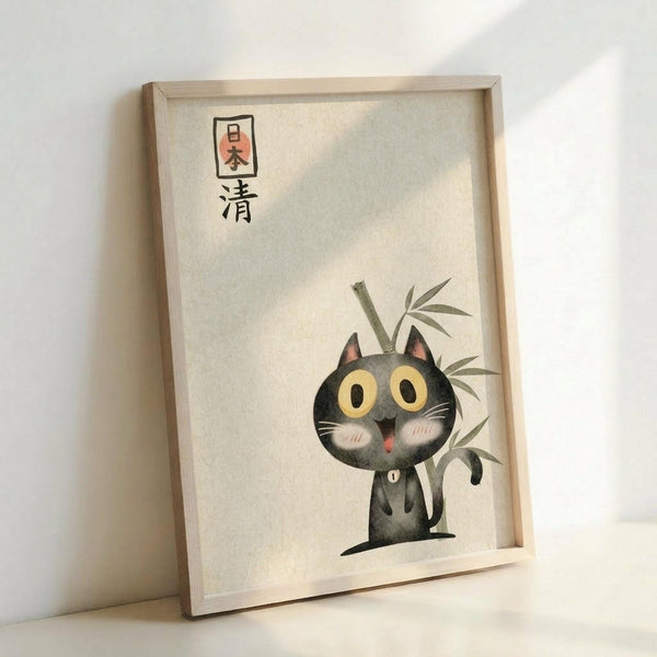May include: Framed poster print featuring a cute black cat with large yellow eyes and pink inner ears sitting next to green bamboo stalks, with Japanese characters and a red stamp at the top, displayed in a light wooden frame against a white wall and surface in soft natural lighting.