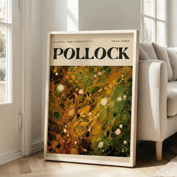 May include: Framed abstract art poster with swirling green, yellow, and brown paint drips and splatters in Jackson Pollock's signature style, leaning against white wall next to beige upholstered chair in bright, naturally-lit room with large windows and light wood floors