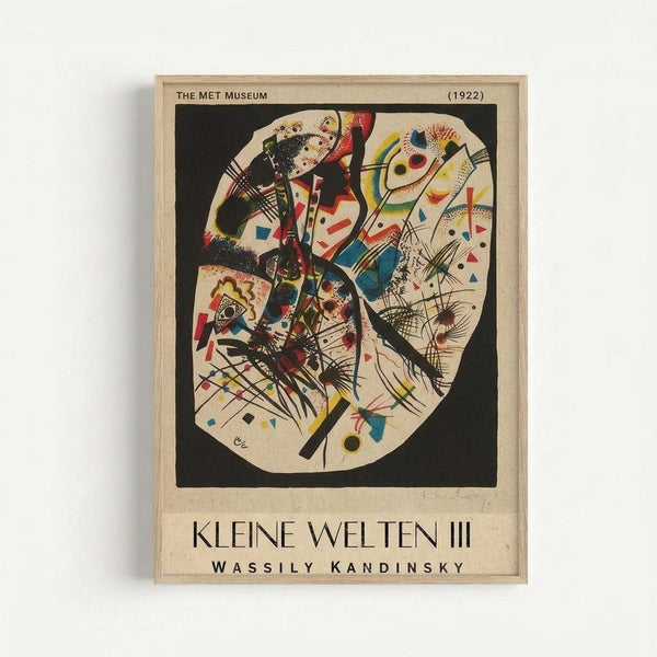 Framed vintage art print featuring Kandinsky's abstract geometric composition with vibrant colors including red, blue, yellow, and black shapes, lines, and patterns against a cream background. The artwork is displayed in a light wood frame against a white wall, showing the museum attribution "THE MET MUSEUM (1922)" at the top and "KLEINE WELTEN III WASSILY KANDINSKY" at the bottom in black text.