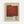 Framed vintage-style art print featuring Mark Rothko's name in large black serif typography above a weathered rust-red rectangular color block. Below shows "Rothko" in bold letters with dates "02.16.90 1903-70" and descriptive text about the artist's mastery of color and emotion. The aged cream background has natural staining and wear marks. Displayed in light wood frame against white wall.