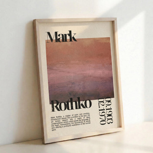 May include: Framed art print featuring Mark Rothko's name in bold black text above a gradient rectangular color field transitioning from cream to coral to deep burgundy. Print includes "Rothko" and "04-30-1970" text with descriptive paragraph about the artist. Light wood frame displayed leaning against white wall on light surface, showing natural lighting and shadows.