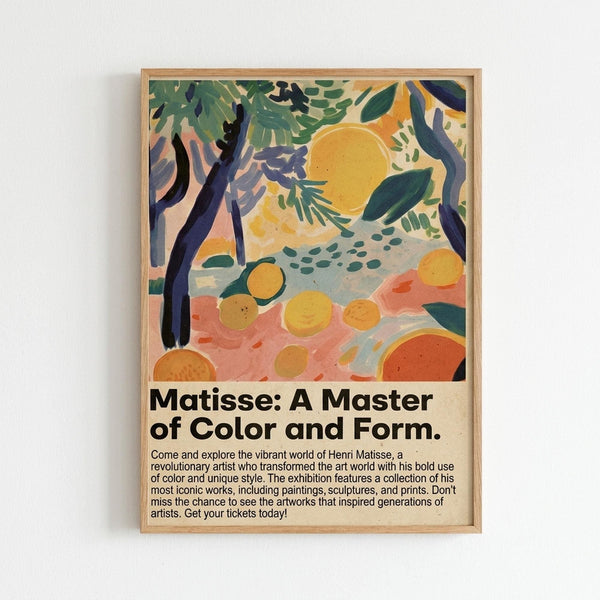 May include: Framed art poster mounted on white wall featuring colorful abstract landscape with orange sun, green foliage, blue tree trunks, coral ground with scattered yellow circles, in vibrant Fauve painting style. Natural wood frame surrounds artwork with exhibition text below describing Henri Matisse's revolutionary use of color and artistic influence.