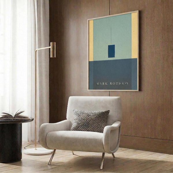 a modern living room with a white armchair, a floor lamp, and a framed abstract art piece on the wall.