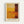 May include: Framed abstract art print in warm golden yellow and deep burgundy red color blocks, displayed on white wall. Light wood frame with cream matting surrounds the geometric composition. Artist name printed below artwork in black text.