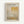 May include: Framed exhibition poster featuring Mark Rothko's abstract artwork with soft rectangular color blocks in muted yellows, grays, and beige tones. Light wood frame against white wall. Poster includes gallery text, artist name, and exhibition dates. Minimalist modern art print with textured, layered appearance typical of Rothko's color field paintings.